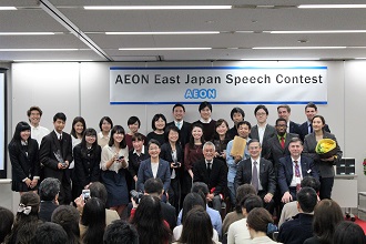 AEON students and teachers posing together after a speech contest in Tokyo. One of the teacher's business responsibilities.