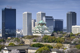 View of Osaka Castle surrounded by skyscrapers in the Kansai region