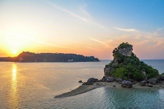 Photo of an island off the coast of Okinawa at sunrise