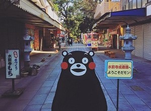 Kumamoto Mascot Stands at Entry of Street